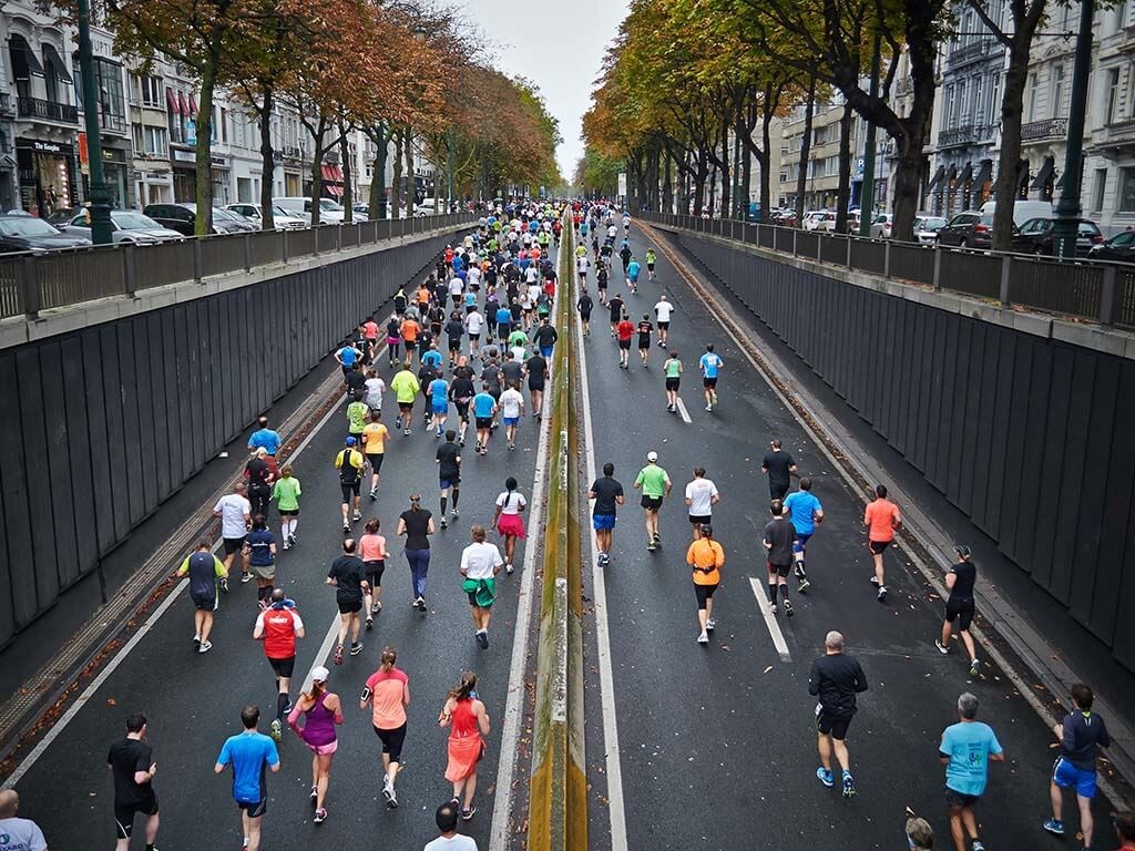 Overhead shot of a marathon taking place in a city